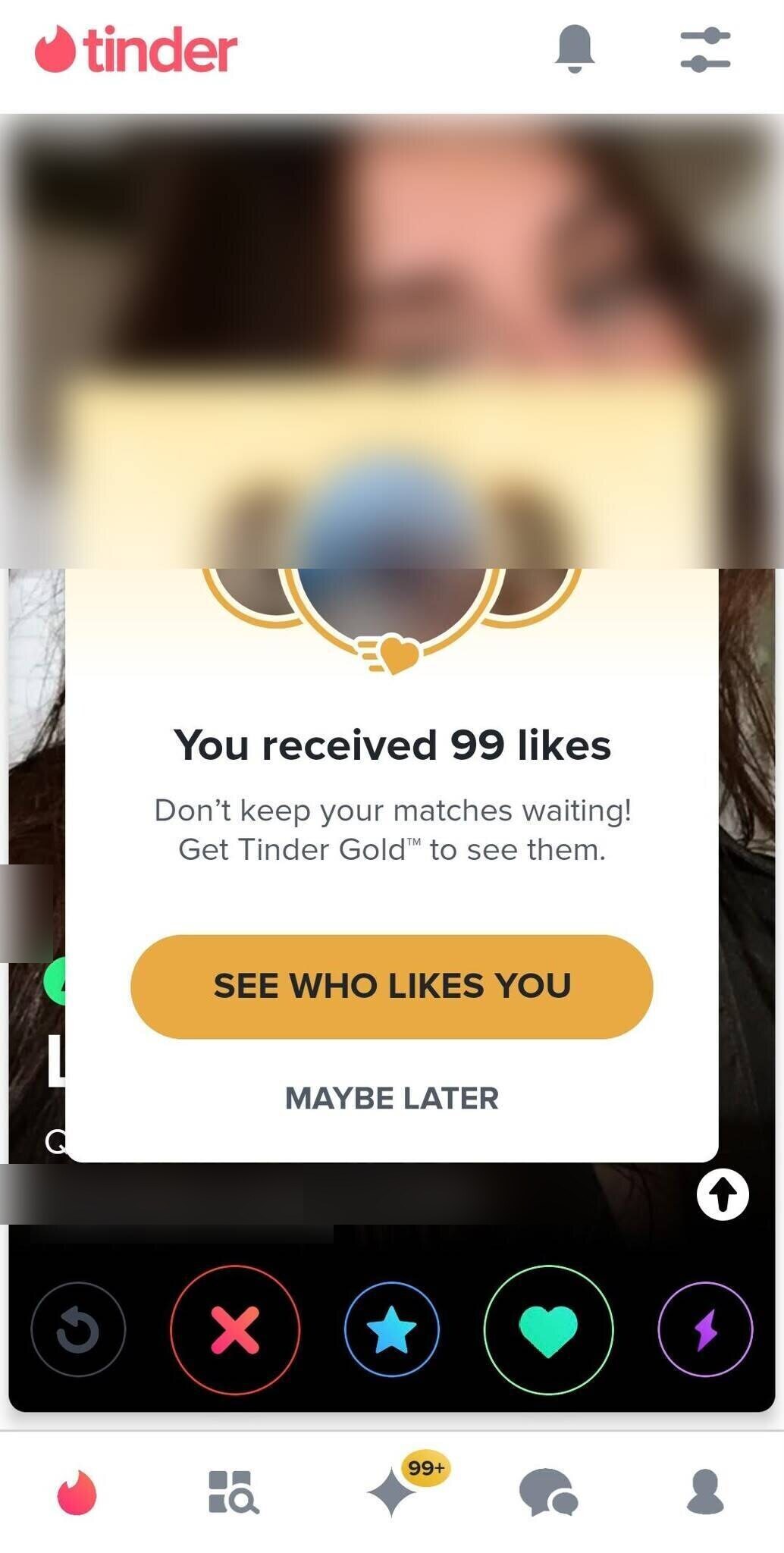 Tinder notification showing 99 likes received, identity blurred